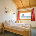 Апартаменты Edelweiss Ferienwohnung, Fluras Alpine Penthouse