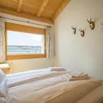 Апартаменты Edelweiss Ferienwohnung, Fluras Alpine Penthouse Флимс